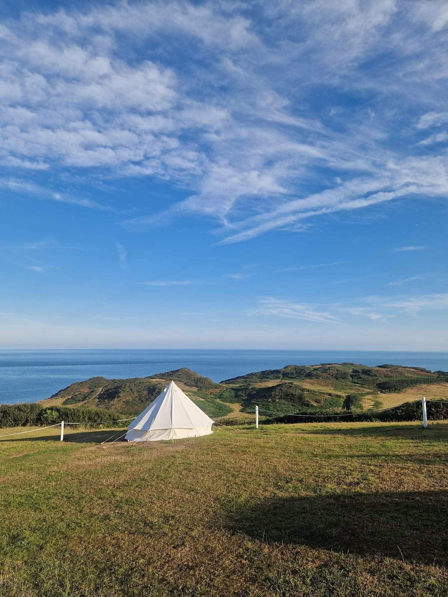 Evening over the fields and the sea