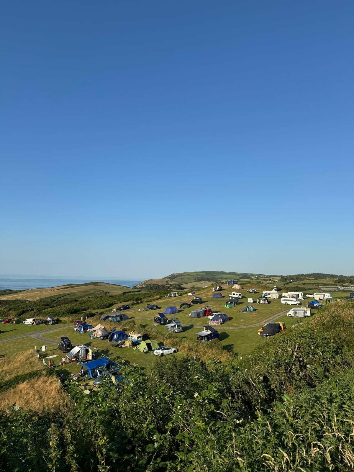 Tents on the field in the evening light