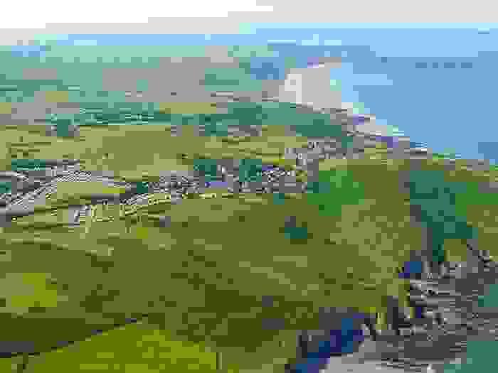 Aerial view of the coast by North Morte Farm